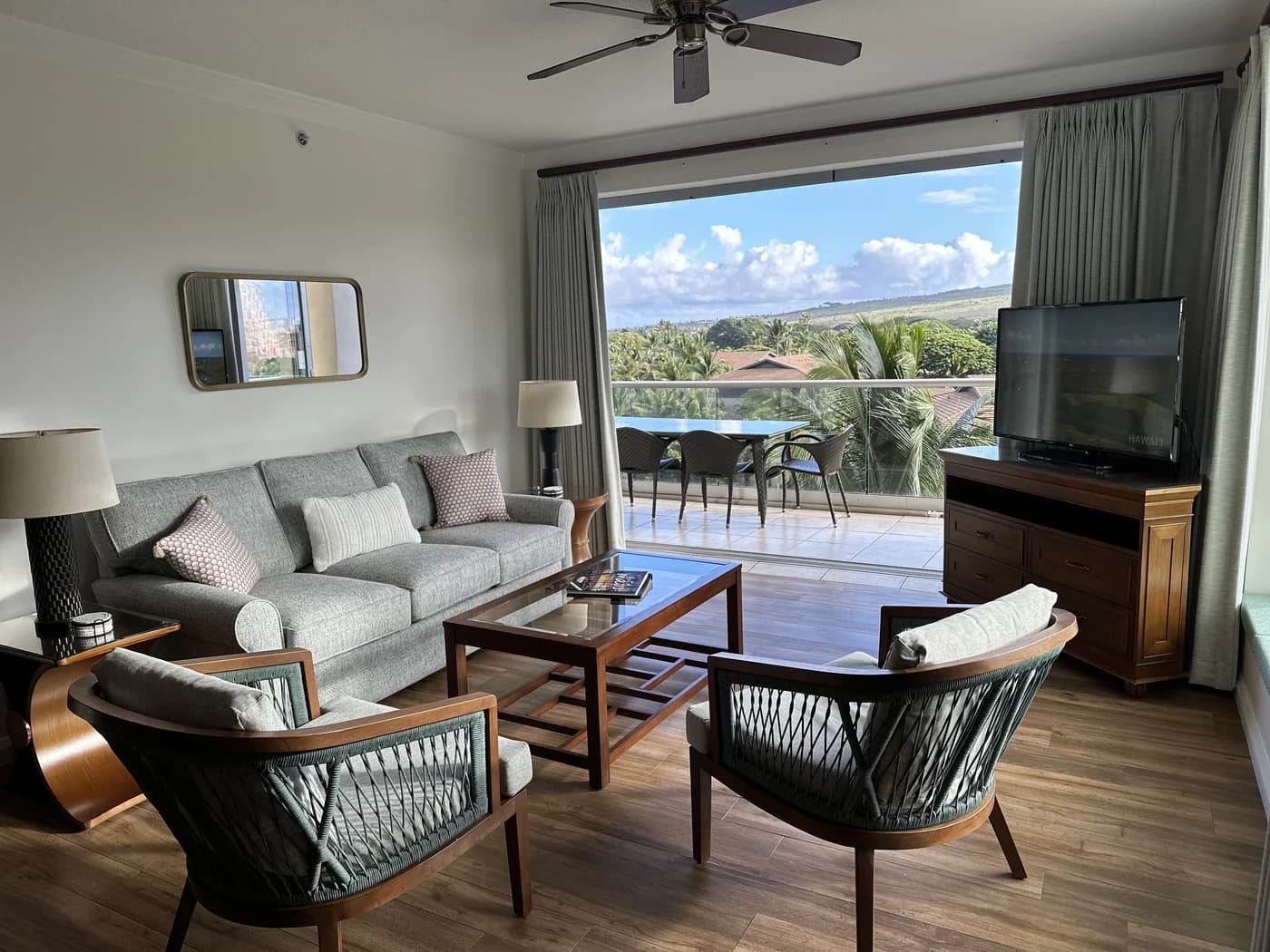 Konea 520’s living room opening onto the mountain-view lanai